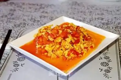 Make Hot tomato fried eggs step 7
