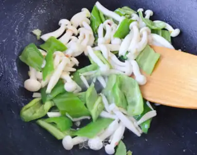 Make White mushroom fried eggs step 9