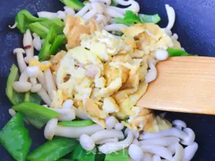 Make White mushroom fried eggs step 10