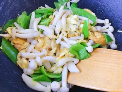 Make White mushroom fried eggs step 11