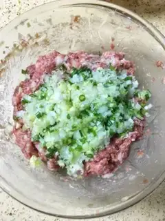 Make Northeast sour pork dumplings step 11