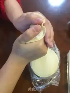 Make Northeast sour pork dumplings step 16