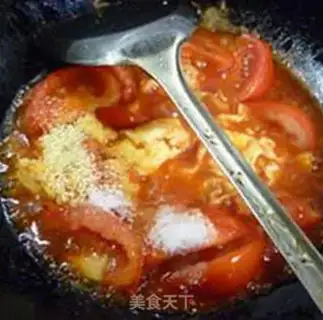 Make Tomato fried eggs step 9