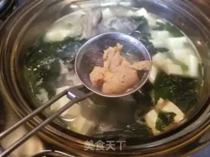 Make Fish head, tofu soup step 7