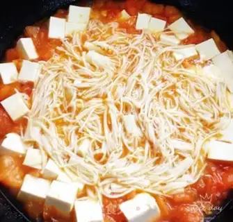 Make Golden Tomato Tofu soup step 10