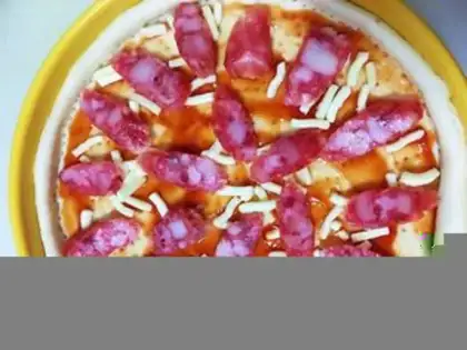 Make The wide sausage pizza step 10