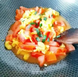Make Tomato fried eggs step 9