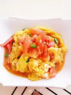 Make Tomato fried eggs step 10