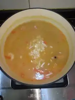 Make Sea duck egg shrimp congee step 7