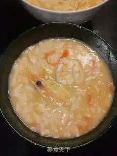 Make Sea duck egg shrimp congee step 8