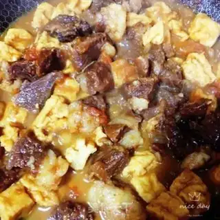 Make Tomato oil and tofu stew step 12