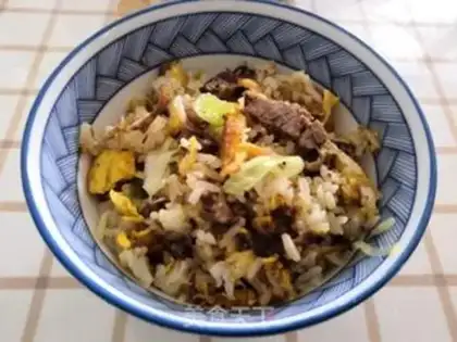 Make Beef pelt and egg fried rice step 11