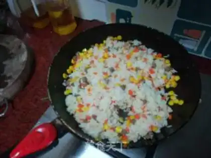 Make Black pepper beef sausage fried rice step 10