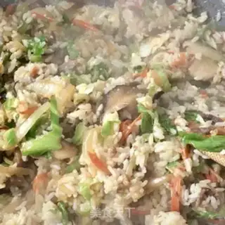 Make Plum mushroom fried rice step 18