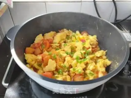 Make Tomato fried eggs step 9