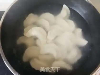 Make Cream mushroom egg dumplings step 23