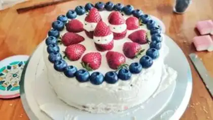 Make Strawberry blueberry Christmas cream cake step 10
