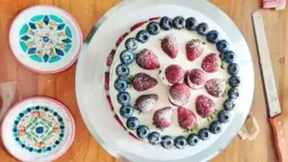 Make Strawberry blueberry Christmas cream cake step 13
