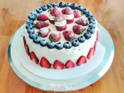 Make Strawberry blueberry Christmas cream cake step 14