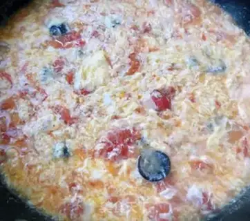 Make Eggs and tomatoes step 9