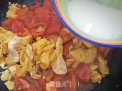 Make Tomato fried eggs step 12
