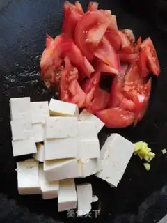 Make Tomato tofu soup step 0