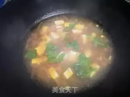 Make Tomato tofu soup step 7