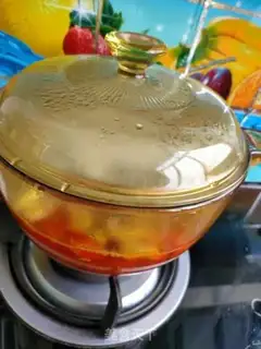 Make Tomato vegetable fish head soup step 14