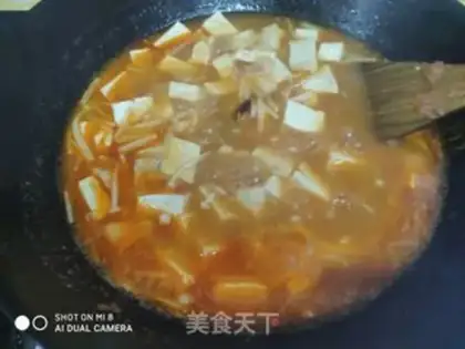 Make Tomato tofu soup step 10