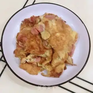 Make Ham sausage fried eggs step 5