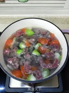 Make Beef tomato smelt soup step 5