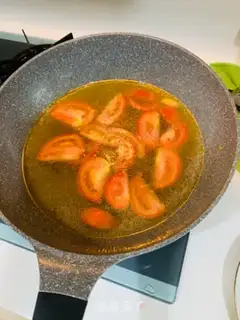 Make Tofu soup with tomatoes step 1