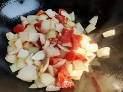 Make Tomato onion fried goose eggs step 7