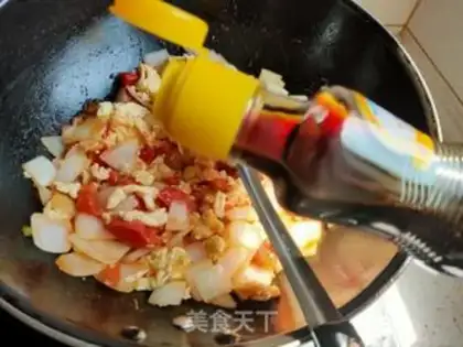 Make Tomato onion fried goose eggs step 9