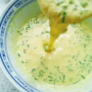 Make All-wheat onion egg pancakes step 3