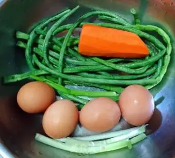 Make Eggs, carrots, fried eggs step 0