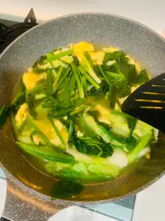 Make The groceries and egg soup step 6