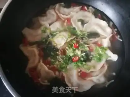 Make Sour sauerkraut pork dumplings step 11