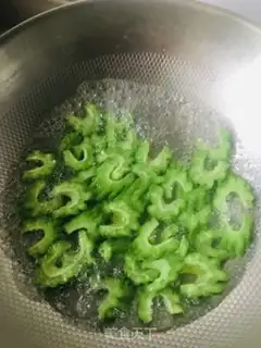 Make Suffering melon with rice step 4