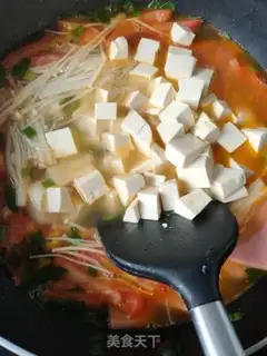 Make Tomato tofu soup step 1