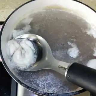 Make Big bone mushroom noodles step 3