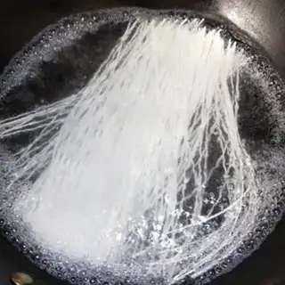 Make Big bone mushroom noodles step 6