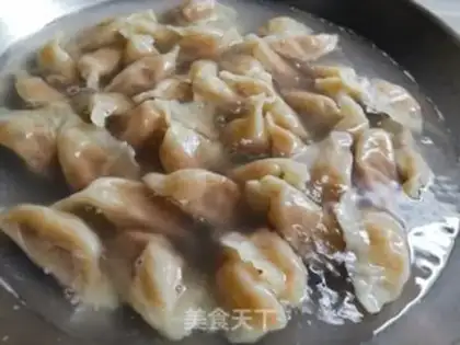 Make Garlic pork dumplings step 9
