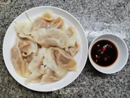 Make Garlic pork dumplings step 10
