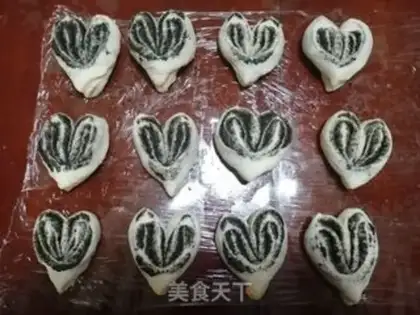 Make Black sesame heart rolls step 10