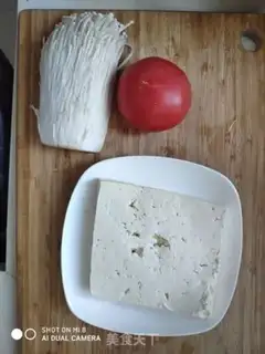 Make Tomato tofu soup step 0