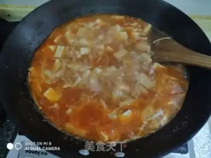 Make Tomato tofu soup step 7