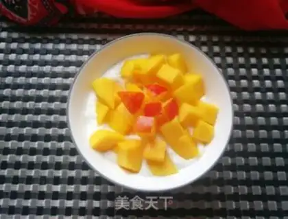 Make Peach mango yogurt bowl step 8