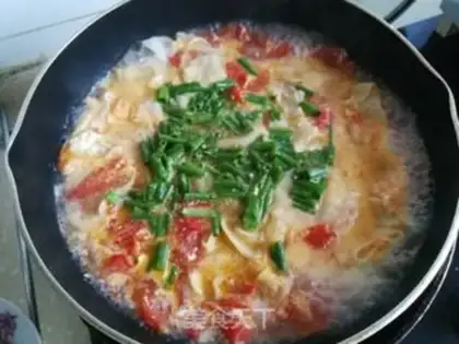 Make Tomato egg-skin soup step 8