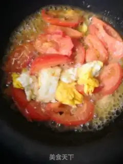 Make Tomato fried eggs step 7